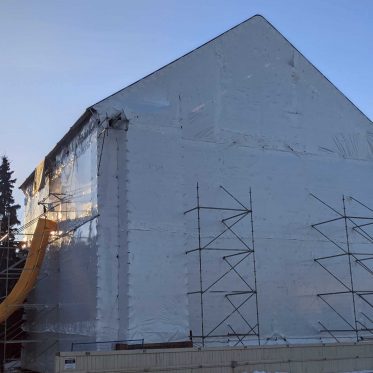 Shrink Wrapped Condominium Access Scaffold with Modular Roof System