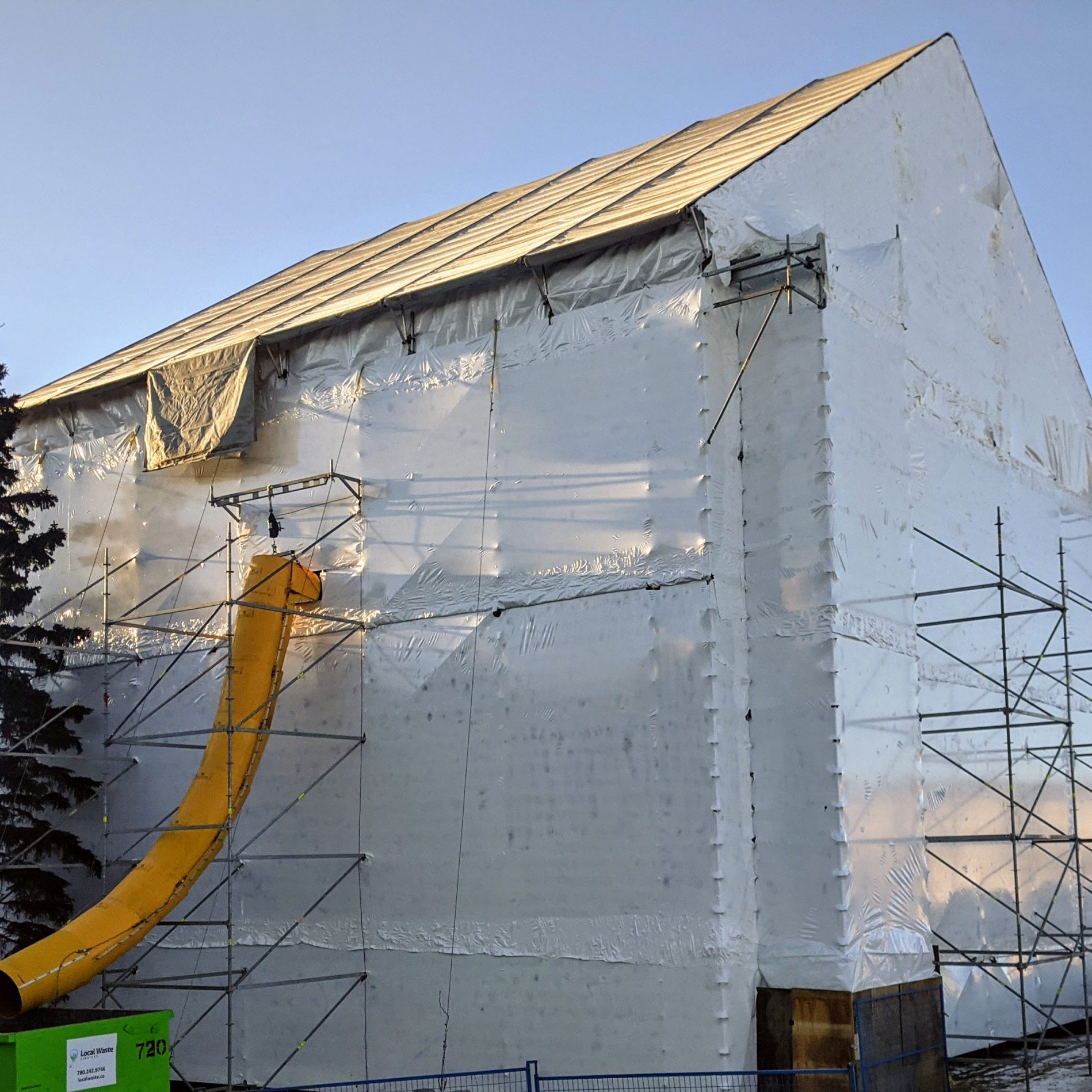 shrink wrap scaffolding with garbage chute