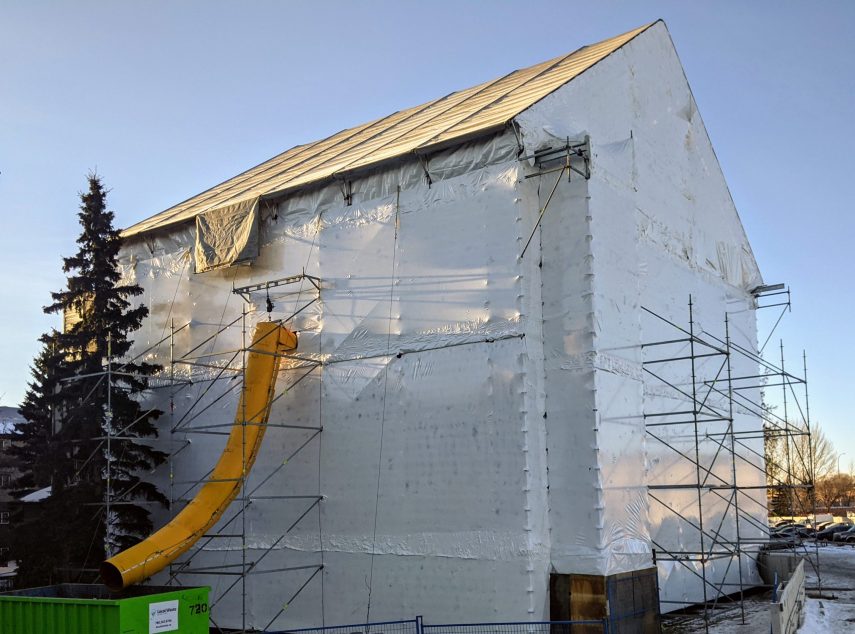 shrink wrap scaffolding with garbage chute